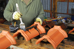 Person painting object